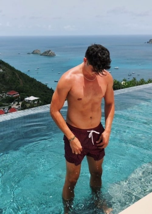 Chris Galya as seen while posing shirtless at St. Barts in July 2018