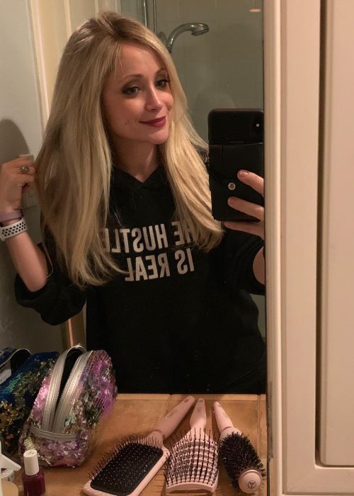 Emme Rylan in an Instagram Mirror Selfie as seen on her Profile in March 2019
