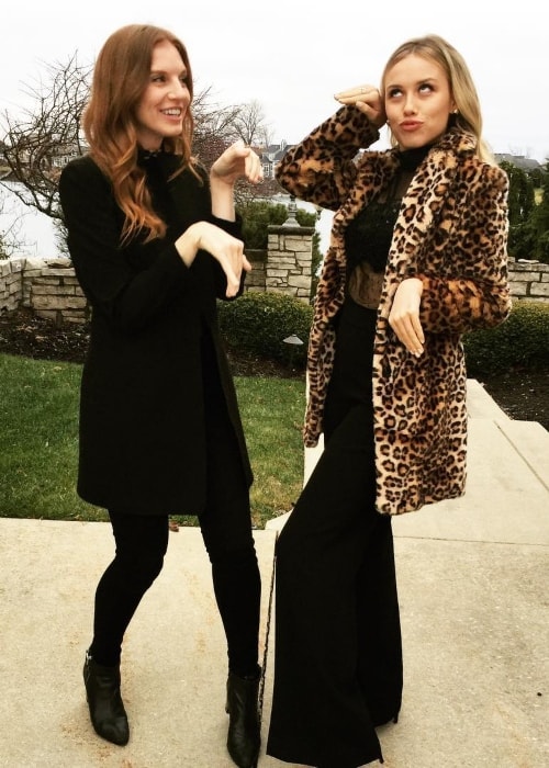 Gracie Dzienny (Right) as seen while making weird poses with older sister, Cassie Dzienny, in January 2019
