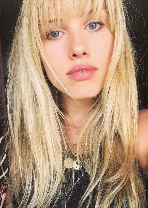 Gracie Dzienny as seen while taking a selfie with forehead bangs in May 2018