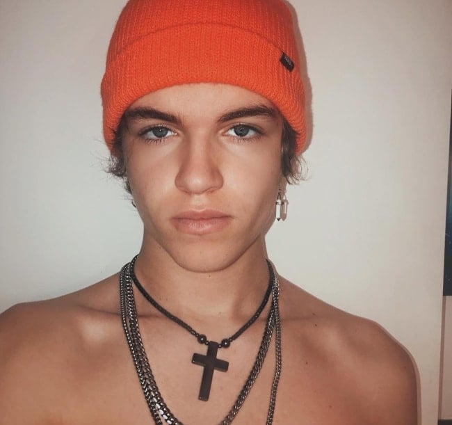 Jaxson Anderson as seen while taking a shirtless selfie wearing an orange beanie in March 2019