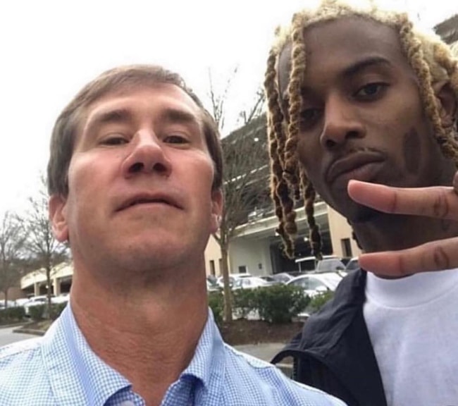 Playboi Carti (Right) as seen while posing for a selfie