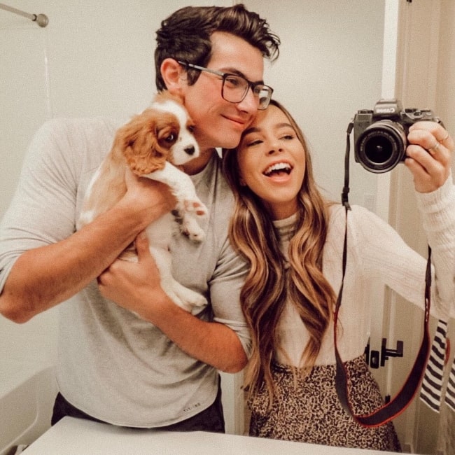 Sierra Furtado as seen while taking a mirror selfie with Alex Terranova and their Cavalier King Charles Spaniel named Penny in October 2018