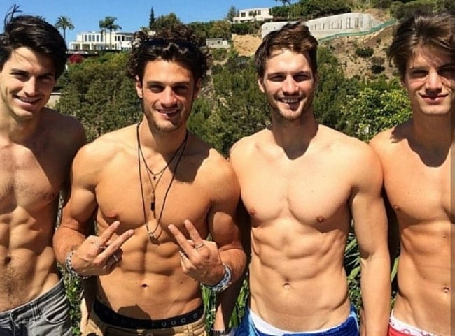 Tomas Skoloudik (Second from Right) as seen while posing shirtless with his mates in Los Angeles, California in February 2019