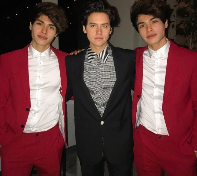Alan Stokes as seen while posing for a picture alongside his brother, Alex Stokes (Left), and actor Cole Sprouse (Center) in March 2019