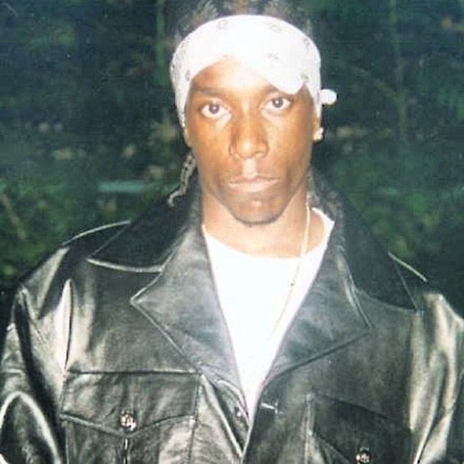 Big L as seen while posing for a photograph wearing a black jacket