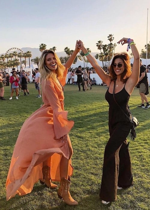 Devin Brugman (Right) as seen while enjoying her time with her dear friend and business partner, Natasha Oakley, at Coachella, California in April 2018