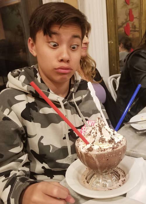 Evan at Serendipity 3 having Frozen Hot Chocolate for dinner in February 2019