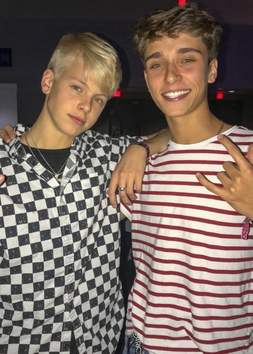 Josh Richards (Right) as seen while posing with singer, songwriter, and guitarist, Carson Lueders, in September 2018