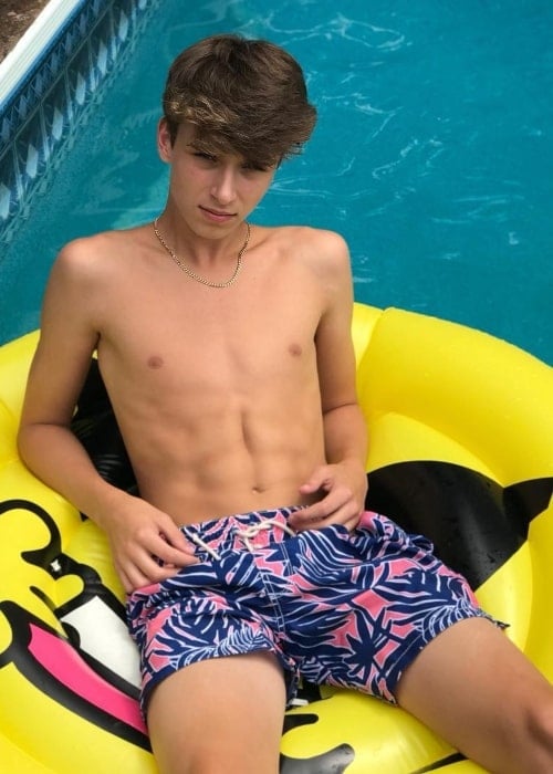 Josh Richards as seen while posing shirtless while enjoying in the pool in August 2018