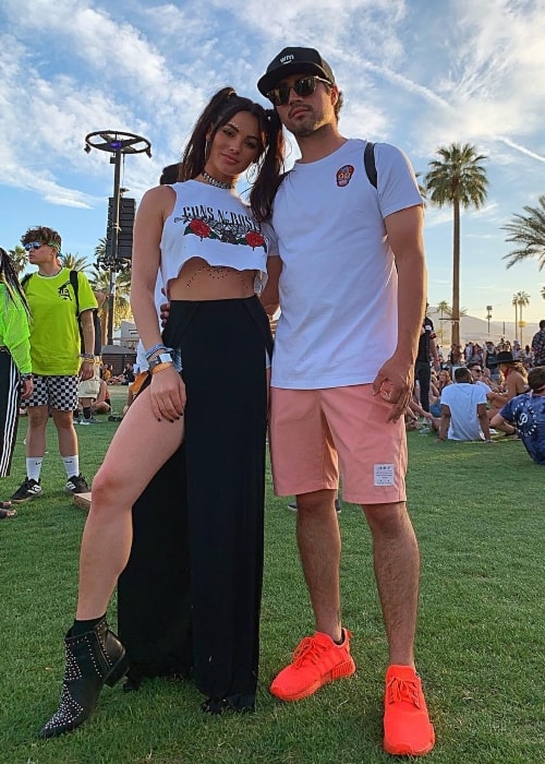 Kayla Fitz as seen while posing with Alan Ampudia at Coachella, California in April 2019