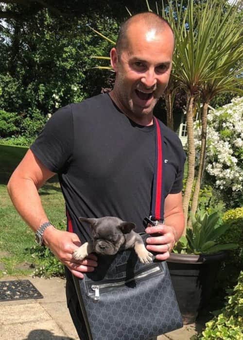 Louie Spence with his dog as seen in May 2019