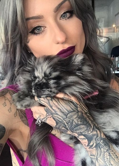 Ryan Ashley Malarkey with her pet dog Volta in a 2017 Instagram selfie
