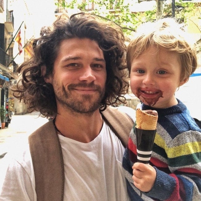 Trent Garrett as seen while posing for an adorable picture with his son in Barcelona, Spain in April 2018
