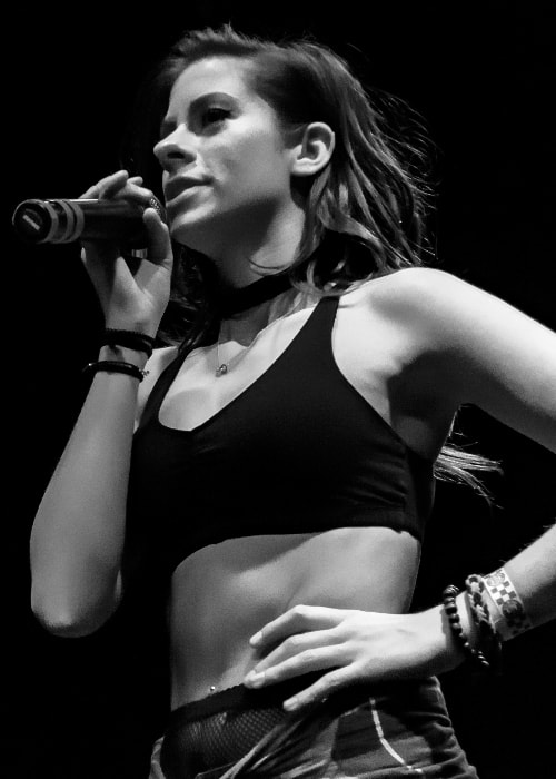 Andie Case as seen in a black-and-white picture while giving a live performance at the Constellation Room in The Observatory Orange County, in Santa Ana, California, United States in December 2016