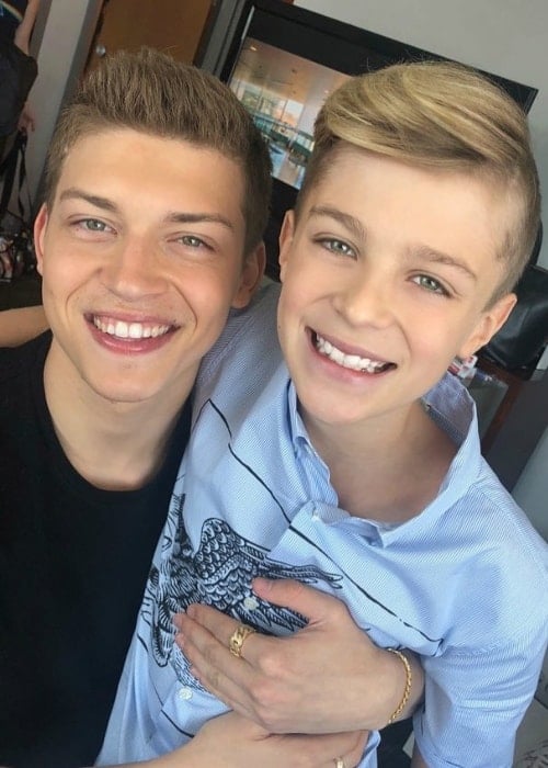 Avi Angel (Right) as seen while posing for a picture with Ricky Garcia in July 2018