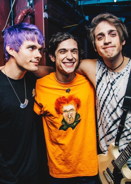 Awsten Knight as seen in a picture with his bandmates Otto Wood (Center) and Geoff Wigington (Right) at the House of Blues Houston in December 2017