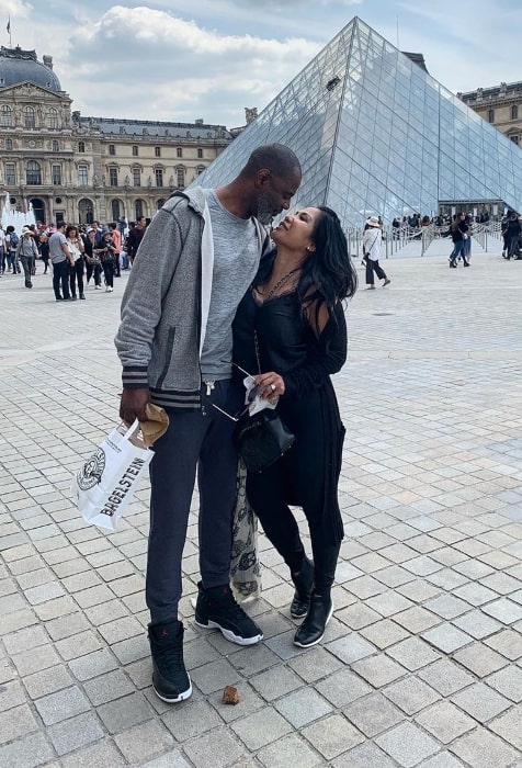 Brian McKnight as seen while posing for a picture with his wife, Leilani Malia Mendoza, at Musée du Louvre in Paris, France in May 2019