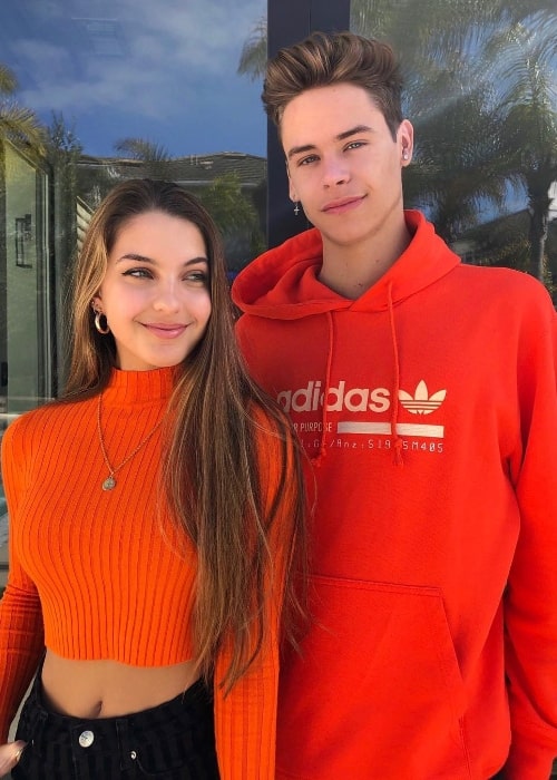 Caleb Burton as seen while posing for a picture with YouTube star and social media personality, Lexi Rivera, at Huntington Beach, California, United States in March 2019