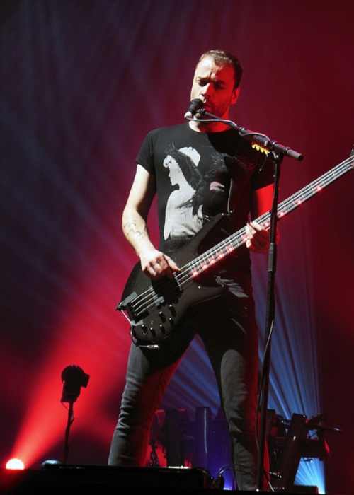 Chris Wolstenholme performing a gig at the Sleep Train Arena in Sacramento in January 2013