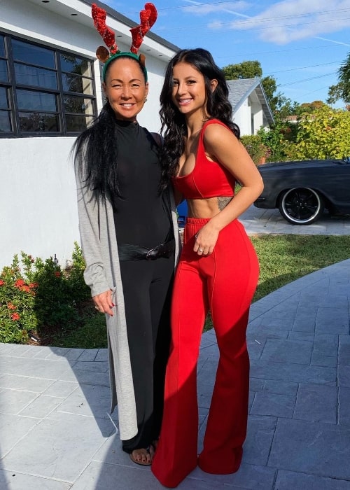 Gabriella Abutbol as seen while posing with her mother while wearing a stunning red outfit in December 2018