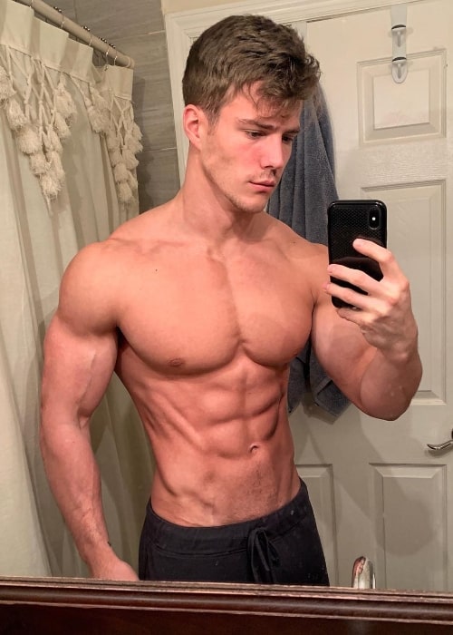 Michael Ꭰean as seen while taking a shirtless mirror selfie in March 2019