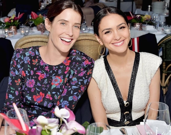 Nazanin Boniadi (Right) as seen while posing for a picture with her 'How I Met Your Mother' co-star, Cobie Smulders, at the Veronica Beard Pacific Palisades Opening in 2019