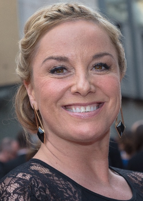 Tamzin Outhwaite as seen while smiling for the camera at the Oliver Awards 2015