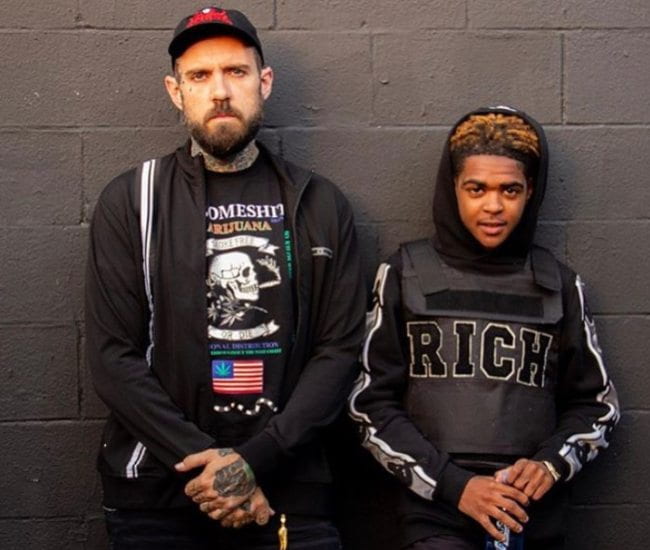 YNW JGreen (Right) and Adam22 as seen in May 2019