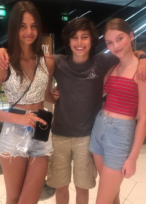 Alec Golinger as seen while posing for a picture with model Ava Louise (Right) and model Whynter Van Ravenstein (Left) at Crown Towers Melbourne in February 2019