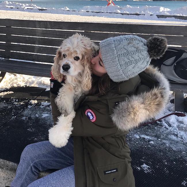 Alex Hook kissing her dog in December 2017