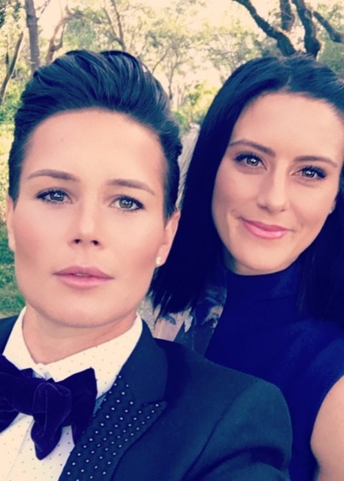 Ashlyn Harris with her girlfriend as seen in December 2017