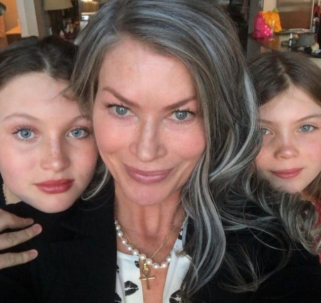 Carré Otis as seen while taking a selfie with her daughters in December 2018