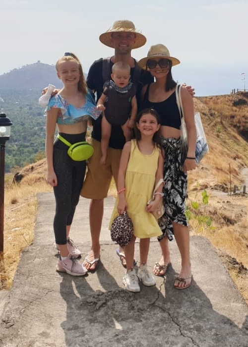 Darren Fizz as seen while posing for a picture with his family in Bali after climbing 600 steps to reach a local temple in July 2019