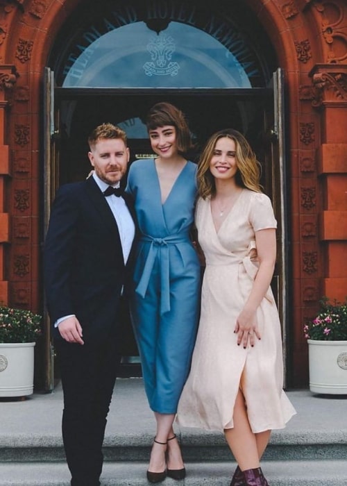 Heida Reed as seen while posing for a picture with Ellise Chappell (Center) and Christian Brassington at The Headland Hotel and Spa in June 2019