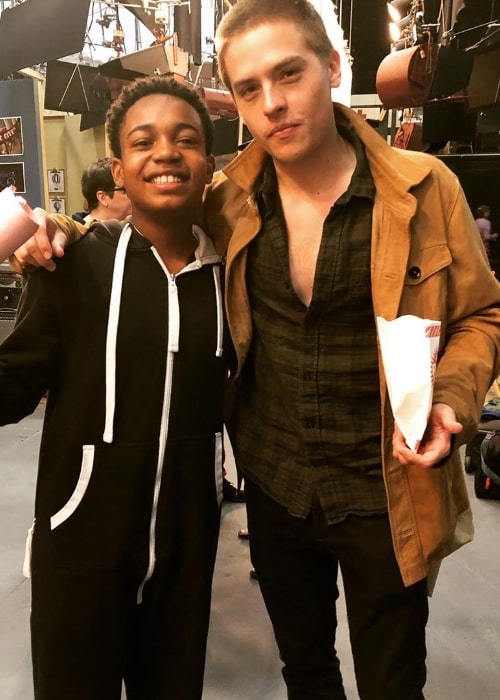 Issac Ryan Brown as seen while posing for a picture with actor Dylan Sprouse on the set of the show 'Raven's Home' in May 2019