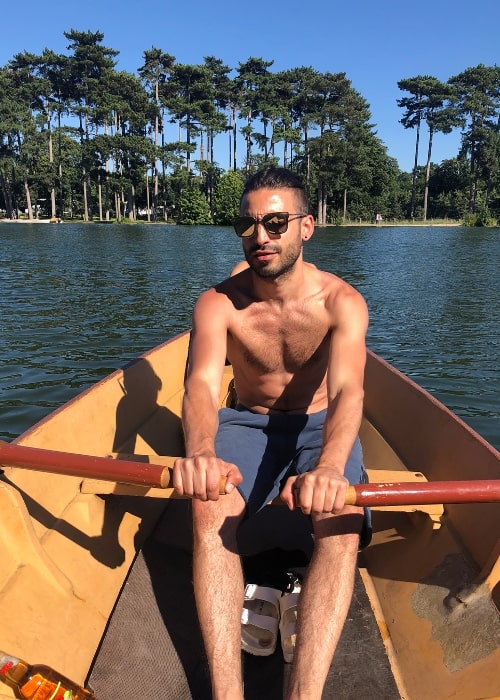 Jade Hassouné as seen shirtless while rowing a boat in Lac du Bois de Boulogne in June 2018
