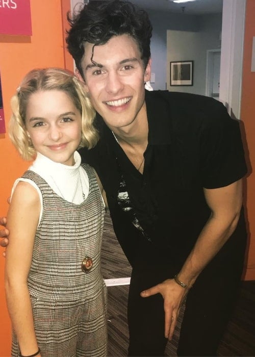 Mckenna Grace as seen while posing for a picture with Canadian singer, songwriter, and model, Shawn Mendes, in May 2019
