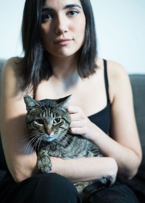 Safiya Nygaard with her cat Crusty as seen in February 2017