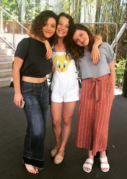 Stefania LaVie Owen as seen while posing for a picture with her sisters, Lolo Owen (Right) and Carly Owen (Left), in April 2016
