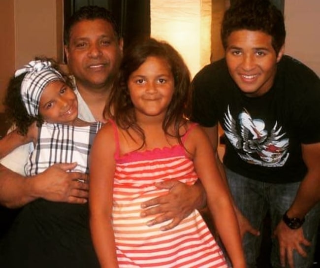 Stevie B as seen while posing for the camera with his family in June 2019