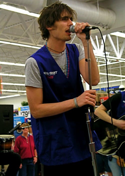 Tyson Ritter performing an acoustic set at Walmart in Houston in March 2006