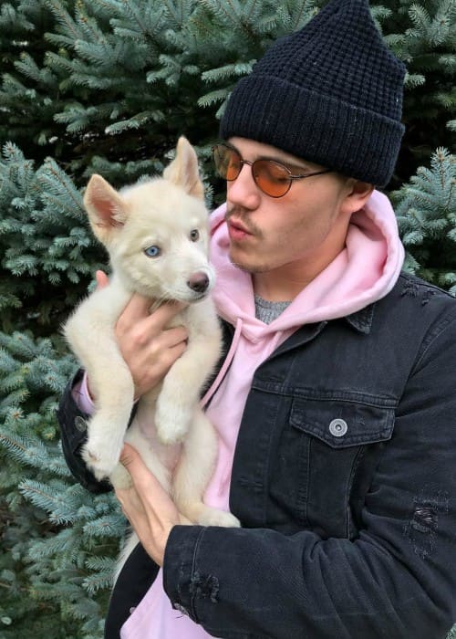 Brad Sousa with his dog as seen in November 2018