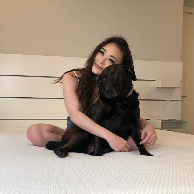 Devyn Lundy with her dog as seen in June 2019