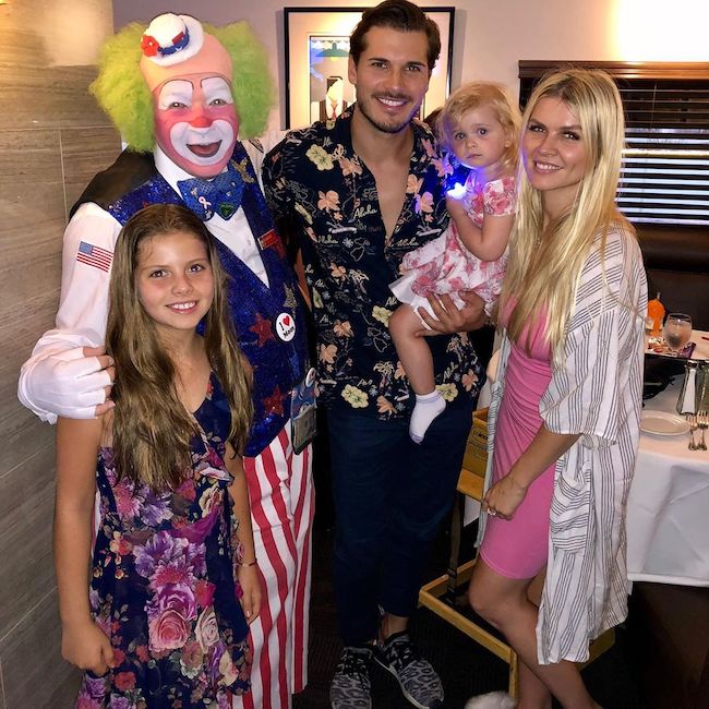 Gleb Savchenko and Elena Samodanova at The Nest with a clown in July 2019