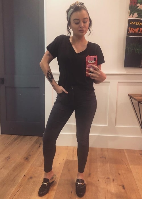 Jordan Hinson as seen while posing for a mirror selfie in an all-black attire in Los Angeles, California, United States in July 2019