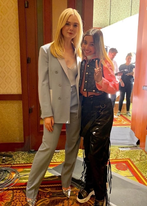 Kylie Cantrall (Right) as seen while posing for a picture along with Elle Fanning in August 2019