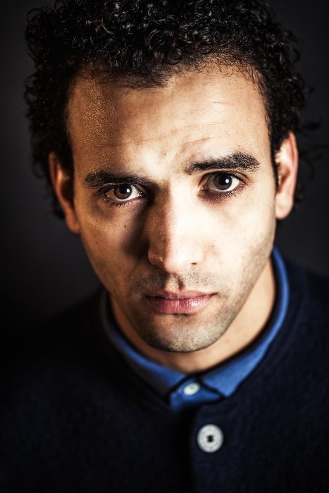 Marwan Kenzari as seen while looking directly at the camera