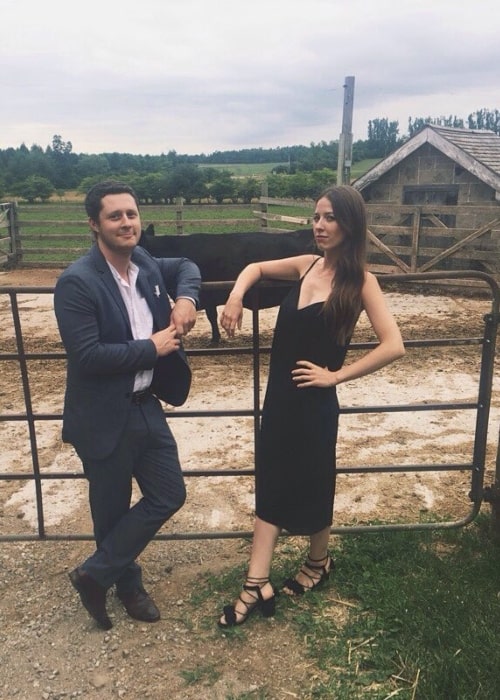 Noah Reid as seen while posing for a picture with Clare Stone in Elora, Centre Wellington, Wellington County, Ontario, Canada in August 2016