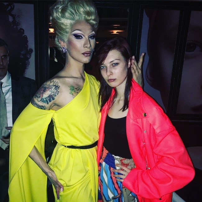 Remington Williams (Right) as seen while posing for a picture along with the popular model and drag queen, Miss Fame, at the Marc Jacobs Shameless Beauty Dinner in March 2018